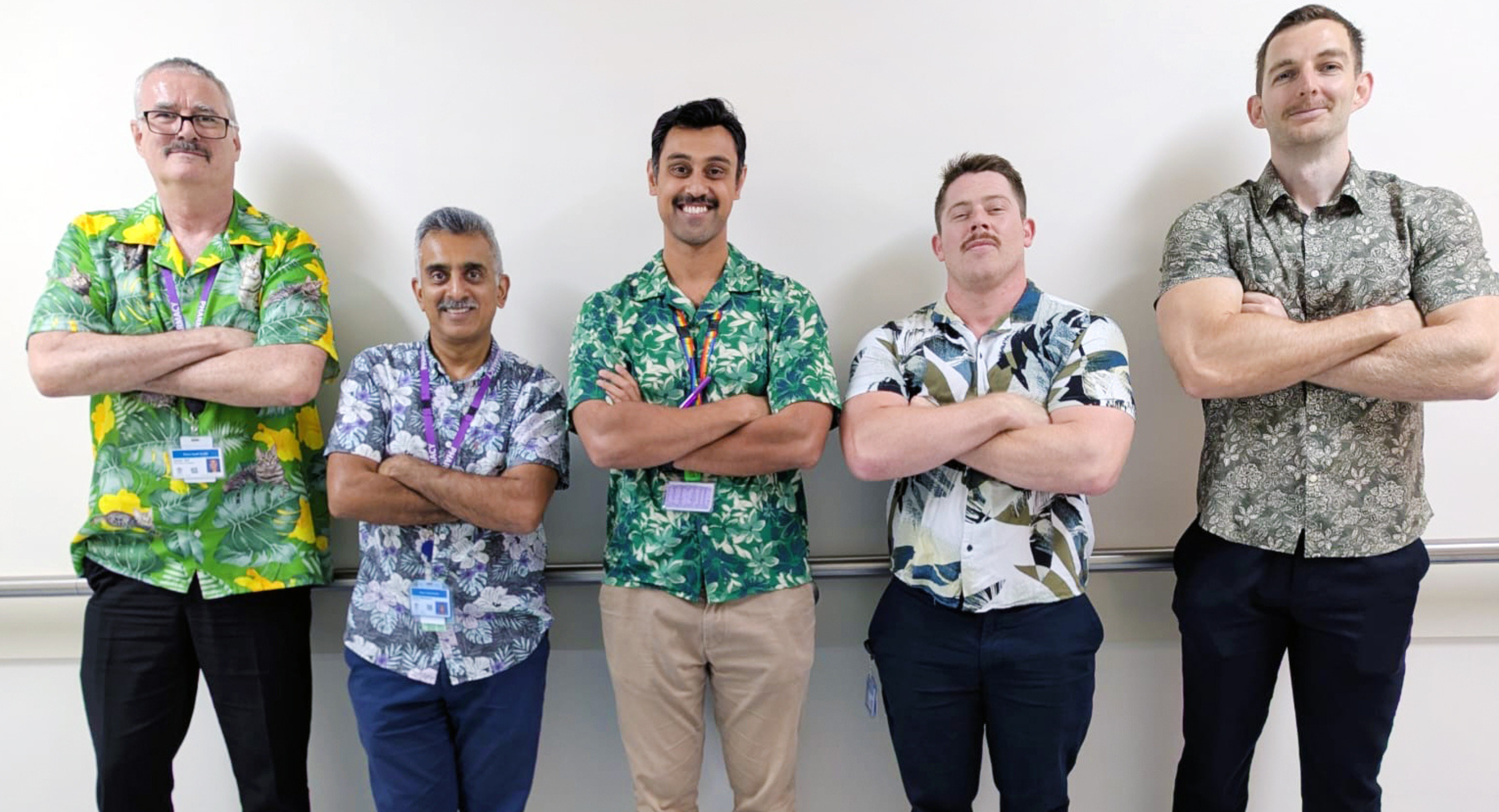 5 Pharmacy team members lined up showing off their moustaches for Movember